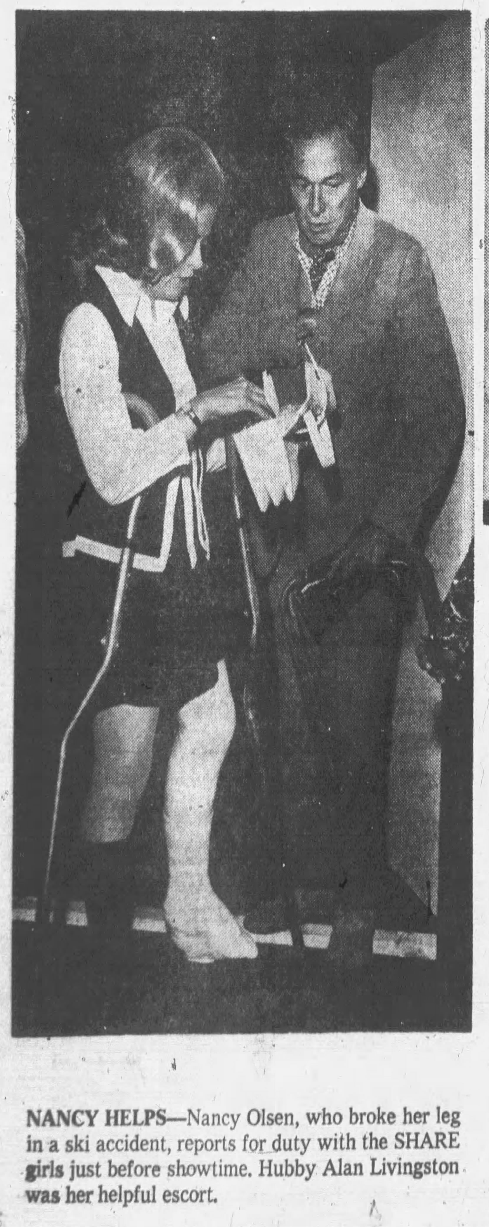 Nancy Olsen was in a cast for several months from skiing. Here she is on Unistrut crutches.